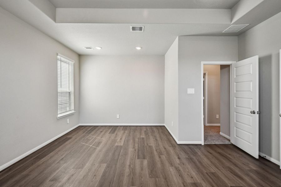 Spacious, unfurnished interior of a new home in Spring Brook Village - Luxe Series, Houston (Image 27).