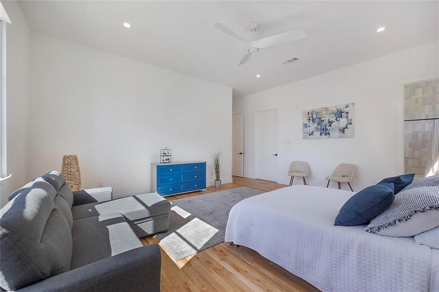 Bedroom with light wood-type flooring and ceiling fan