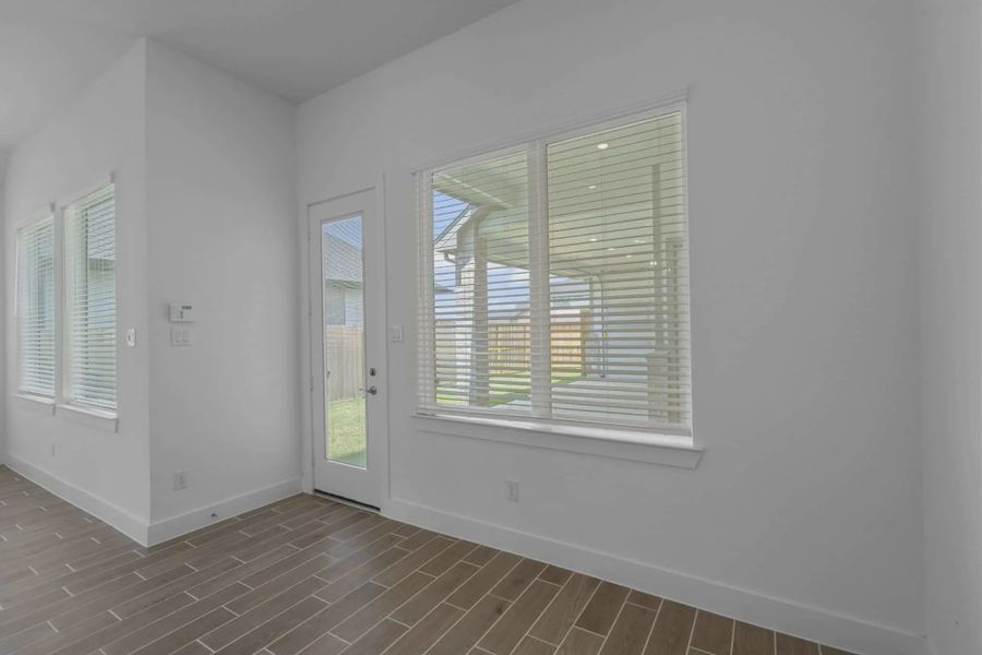Representative unfurnished interior of a home built from the Mickelson by Chesmar Homes in Riceland Alley Loads, Mont Belvieu (Image 81).
