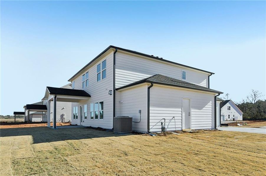 Exterior details and patio area of a home in River Pointe, Monroe (Image 25).