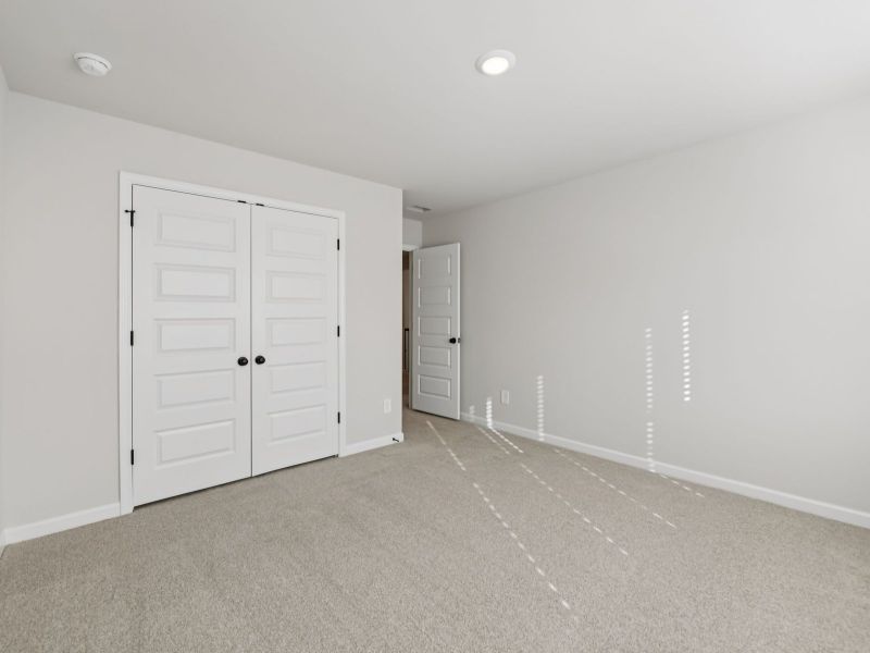 The Taylorsville floorplan with the Divine White interior package.