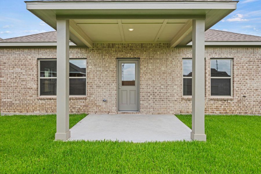 Exterior details and patio area of a home in Windrose Green, Angleton (Image 21). Exterior details and patio area of a home in Windrose Green, Angleton (Image 21).