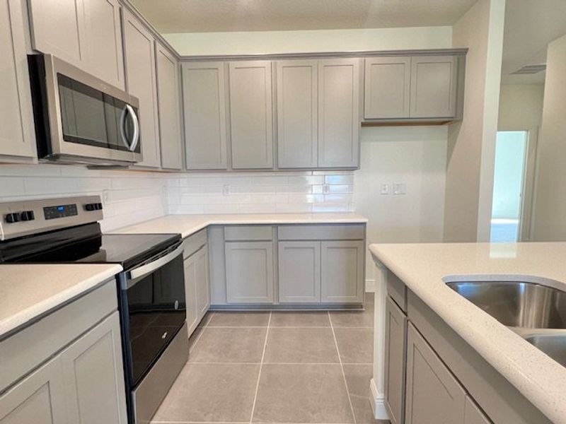 Furnished interior view inside a new home in Lakes At St Sebastian, Micco (Image 7).