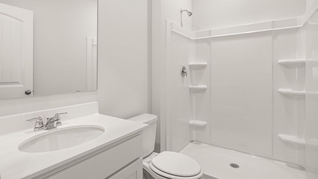 Representative furnished interior of a home built from the Hanover by D.R. Horton in Thompson Ridge, Dallas (Image 7).