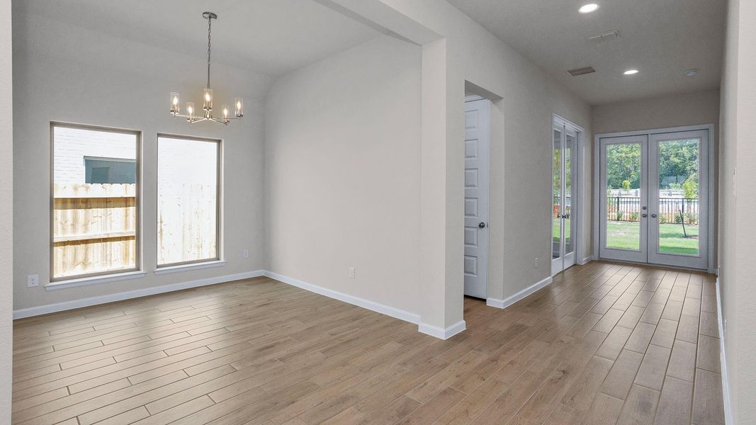 Spacious, unfurnished interior of a new home in The Groves 45', Humble (Image 8).