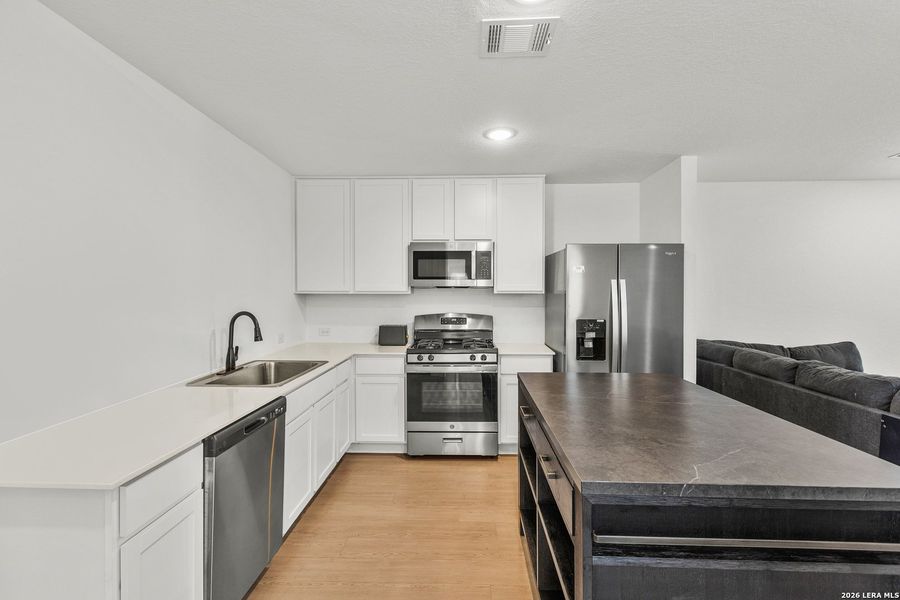 Furnished interior view inside a new home in Brookmill, San Antonio (Image 9).