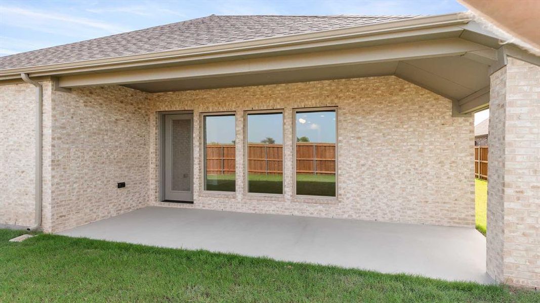 Rear view of house with a patio