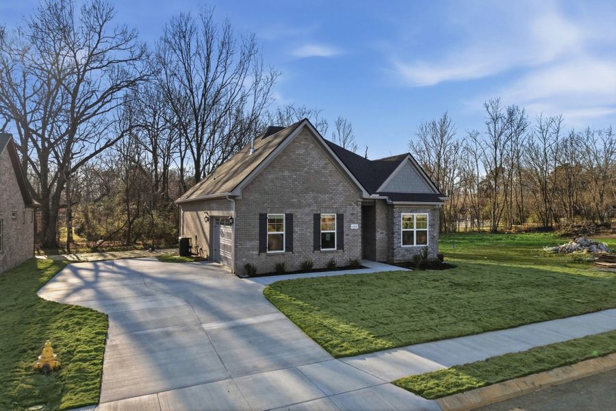 Front exterior of a new home in Sagewood, Tullahoma, TN, highlighting curb appeal (Image 24).