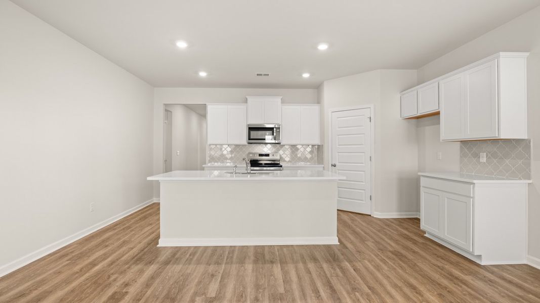 Furnished interior view inside a new home in Oakchase at Hampton, Hampton (Image 7).