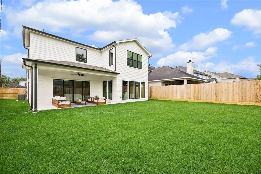 Exterior details and patio area of a home in , Houston (Image 3).