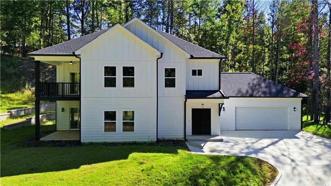 Front exterior of a new home in , Covington, GA, highlighting curb appeal (Image 1). Front exterior of a new home in , Covington, GA, highlighting curb appeal (Image 1).