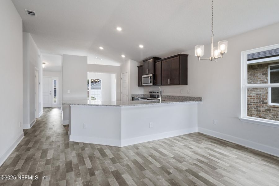 Furnished interior view inside a new home in Shadow Crest at Rolling Hills, Green Cove Springs (Image 6).