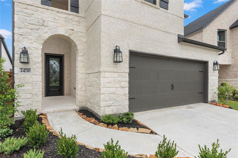 Exterior details and patio area of a home in Elyson - 40', Katy (Image 3). Exterior details and patio area of a home in Elyson - 40', Katy (Image 3).