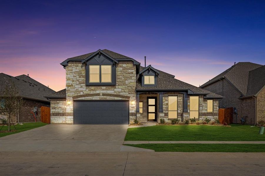 Front exterior of a new home in Timberbrook, Justin, TX, highlighting curb appeal (Image 27).