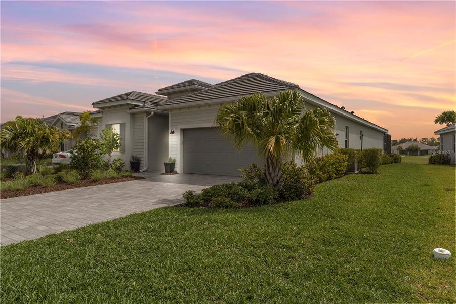Front exterior of a new home in , Punta Gorda, FL, highlighting curb appeal (Image 22).
