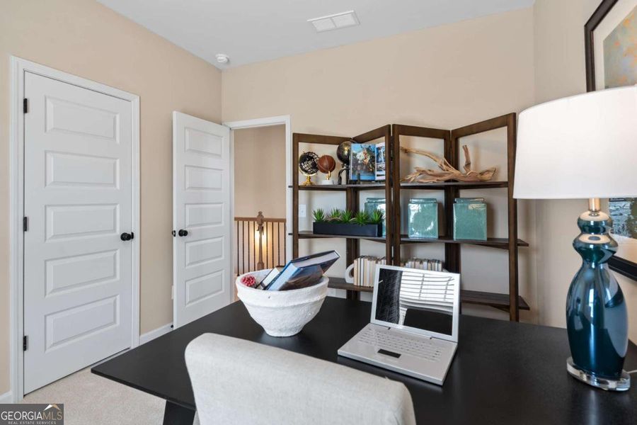 Furnished interior view inside a new home in Glendale Towns, Conyers (Image 24).