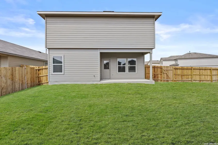 Exterior details and patio area of a home in Redbird Ranch, San Antonio (Image 3).