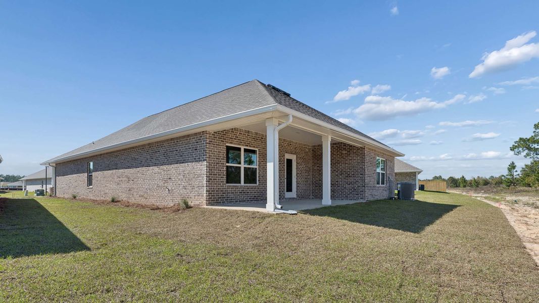 Exterior details and patio area of a home in Owl's Head Farms, Freeport (Image 4).