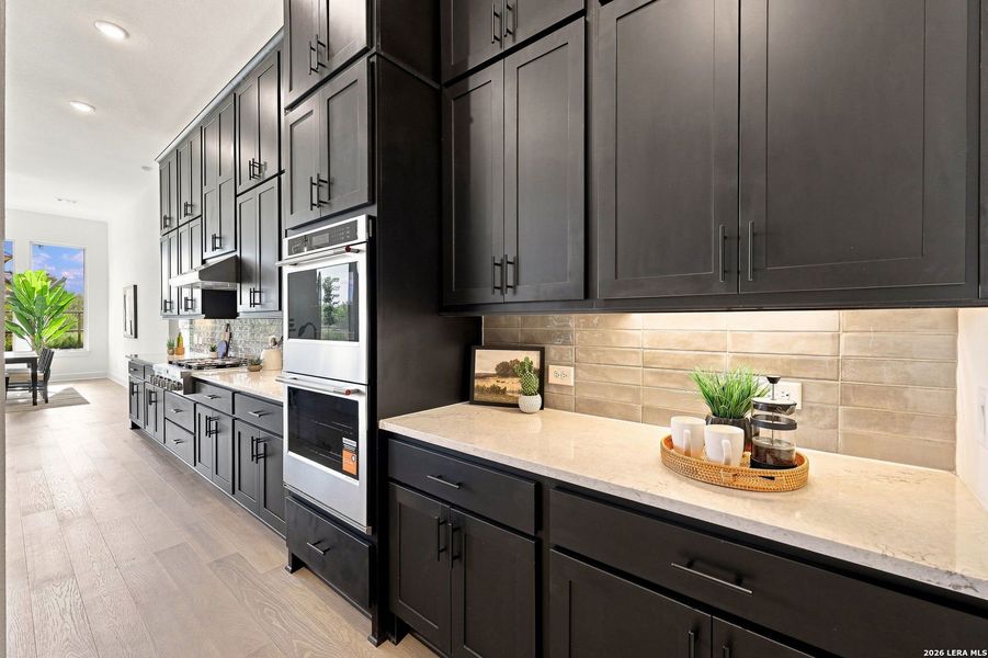 Furnished interior view inside a new home in Shavano Highlands, San Antonio (Image 17).