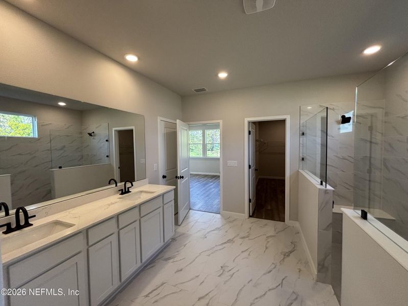 Furnished interior view inside a new home in Reserve East, Flagler Beach (Image 8).
