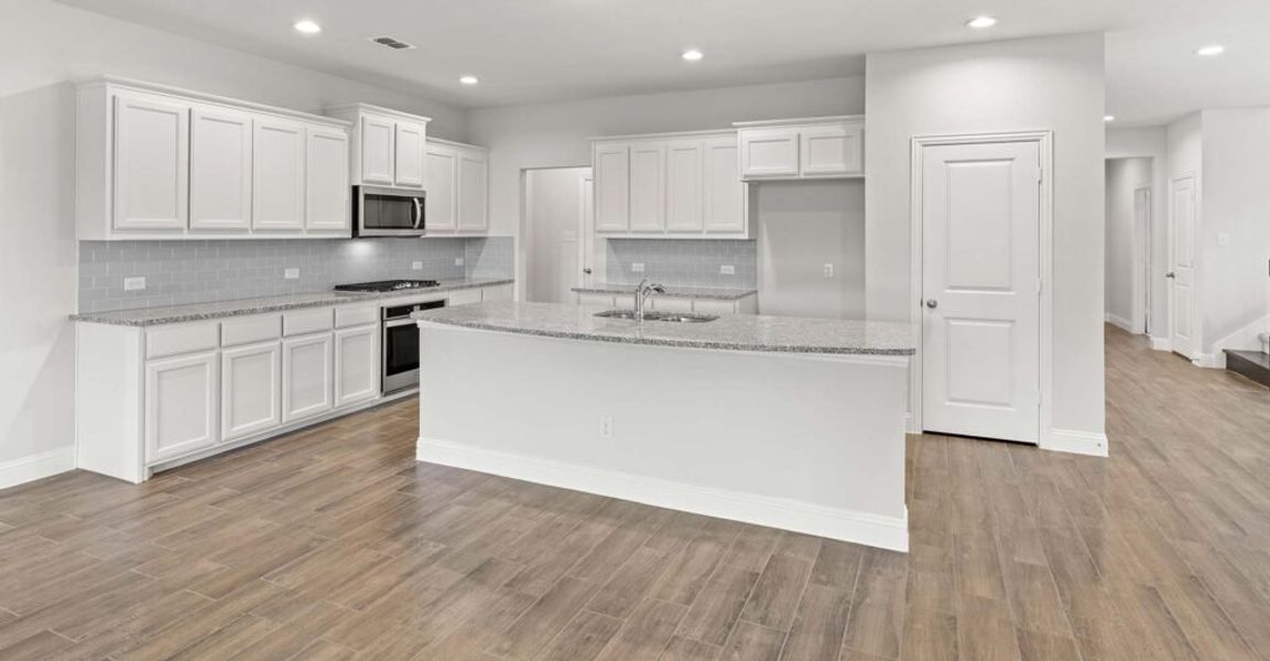 Representative exterior photo of a completed home built from the Goodrich by Impression Homes in Timberbrook, Justin, TX (Image 6).