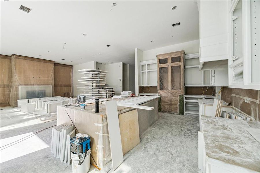 A truly impressive space with design details and finishes that flow perfectly.  The gorgeous white oak cabinet in the kitchen will be complete with a glass front.  Construction as of 10/29