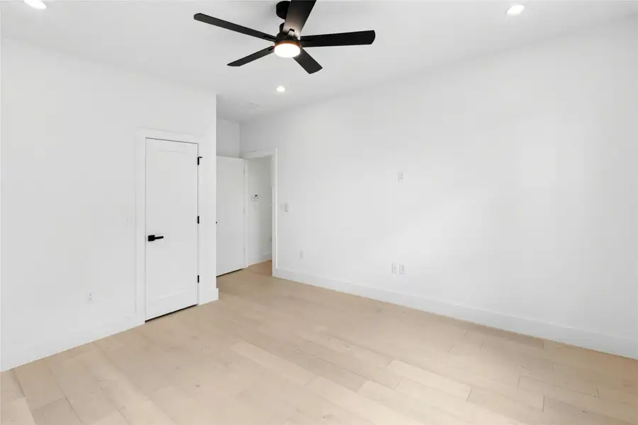 Spare room with recessed lighting, light wood finished floors, and a ceiling fan Spare room with recessed lighting, light wood finished floors, and a ceiling fan