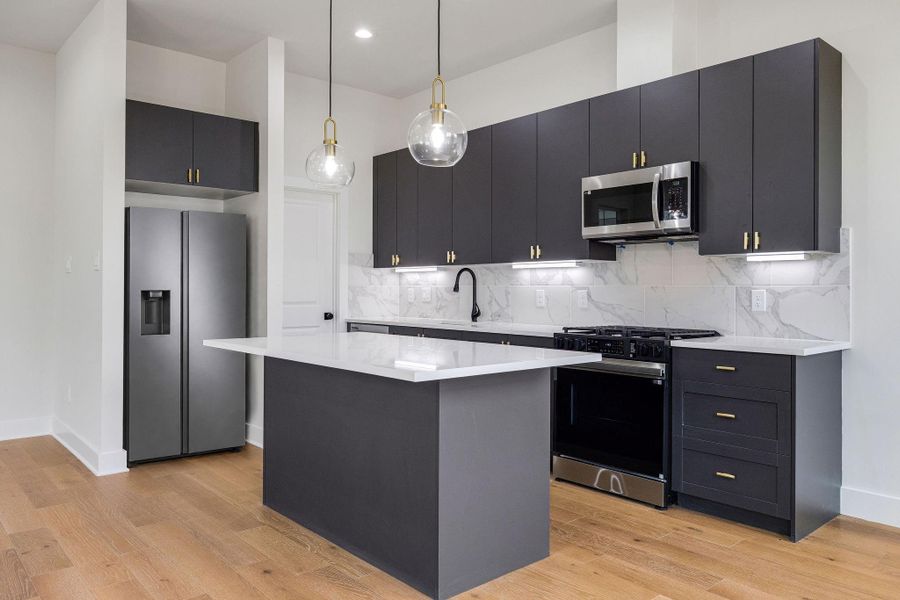 Gourmet kitchen with quartz countertops and center island Gourmet kitchen with quartz countertops and center island