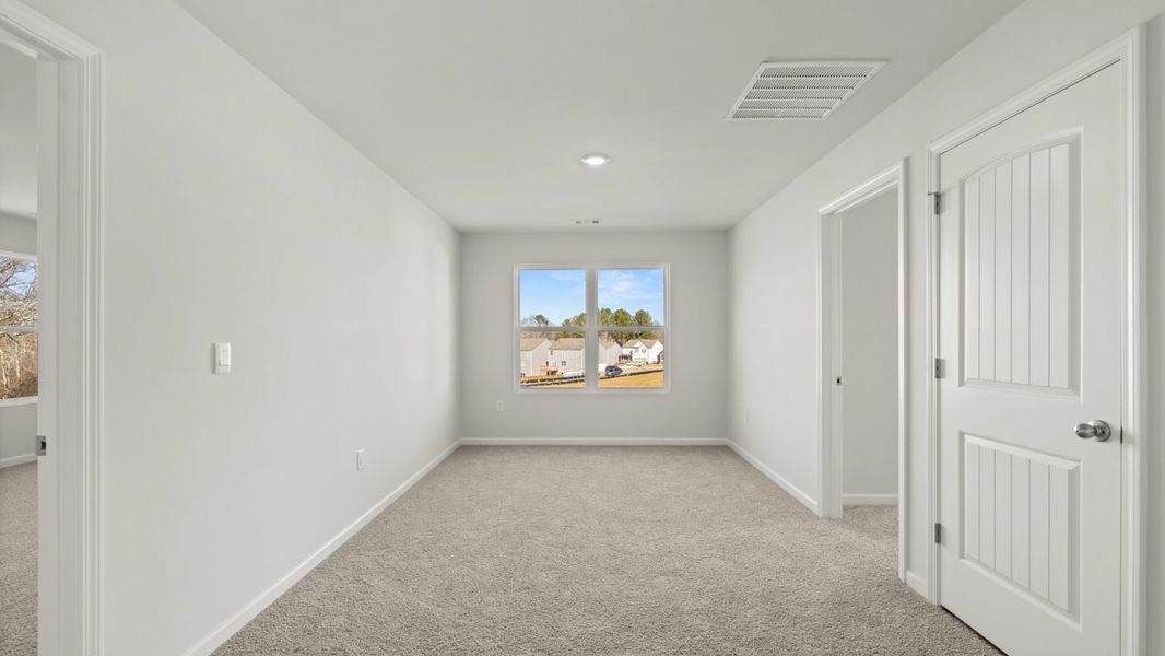 Representative unfurnished interior of a home built from the Fayette ll by D.R. Horton in Braselton Village, Braselton (Image 23).