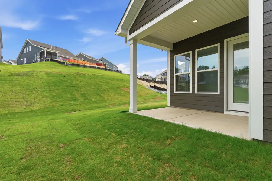 Exterior details and patio area of a home in River Falls, Tega Cay (Image 3).
