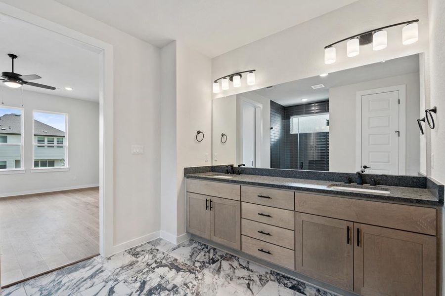 Furnished interior view inside a new home in Park Collection at Heritage, Dripping Springs (Image 7). Furnished interior view inside a new home in Park Collection at Heritage, Dripping Springs (Image 7).