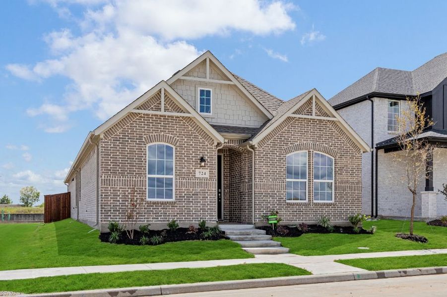 Representative exterior photo of a completed home built from the Cedar by UnionMain Homes in Edgewater, Fate, TX (Image 23). Representative exterior photo of a completed home built from the Cedar by UnionMain Homes in Edgewater, Fate, TX (Image 23).