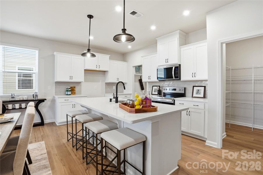 Furnished interior view inside a new home in The Townes at Cheyney, Charlotte (Image 8).