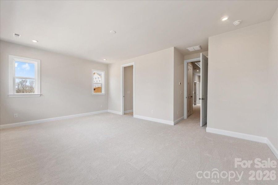 Light-filled primary bedroom