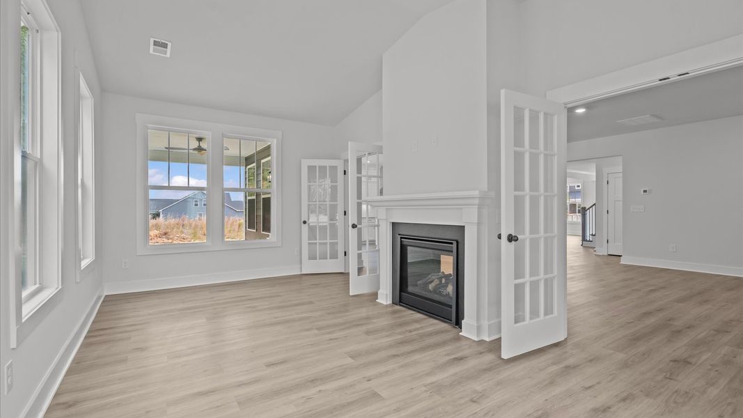 Superior design shines in this morning room with fireplace