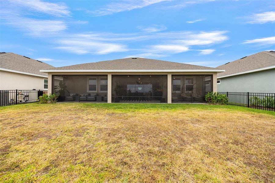 Exterior details and patio area of a home in Seaire, Parrish (Image 27).