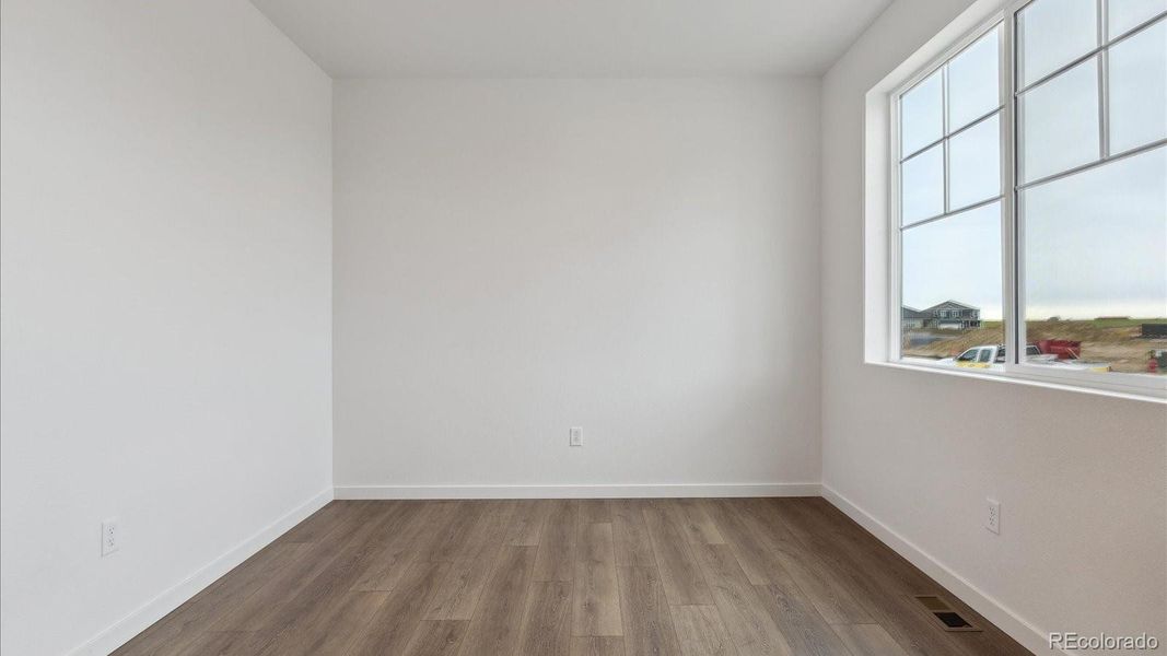 Spacious, unfurnished interior of a new home in Silver Peaks, Lochbuie (Image 19).