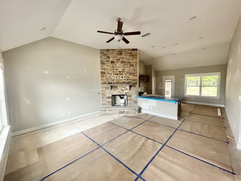 Stock. Got to love the corner fireplace. Your stone will be a light grey