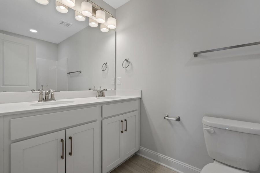 Furnished interior view inside a new home in Sweetgrass Station, Summerville (Image 6).