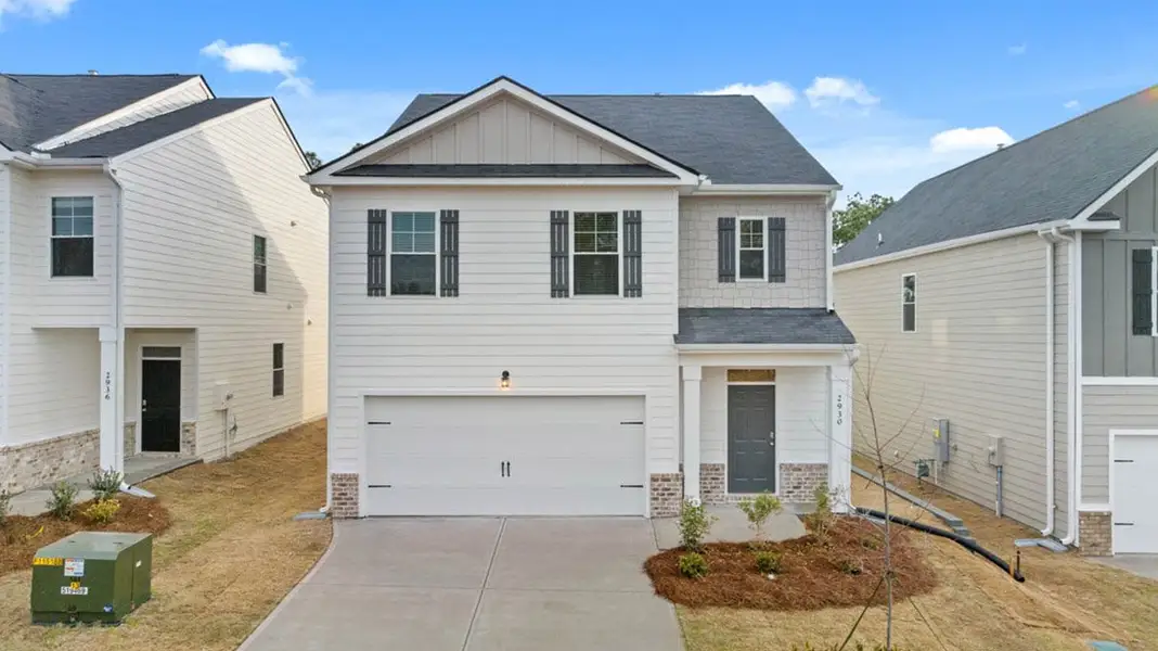 Front exterior of a new home in The Islands, Beech Island, SC, highlighting curb appeal (Image 1).