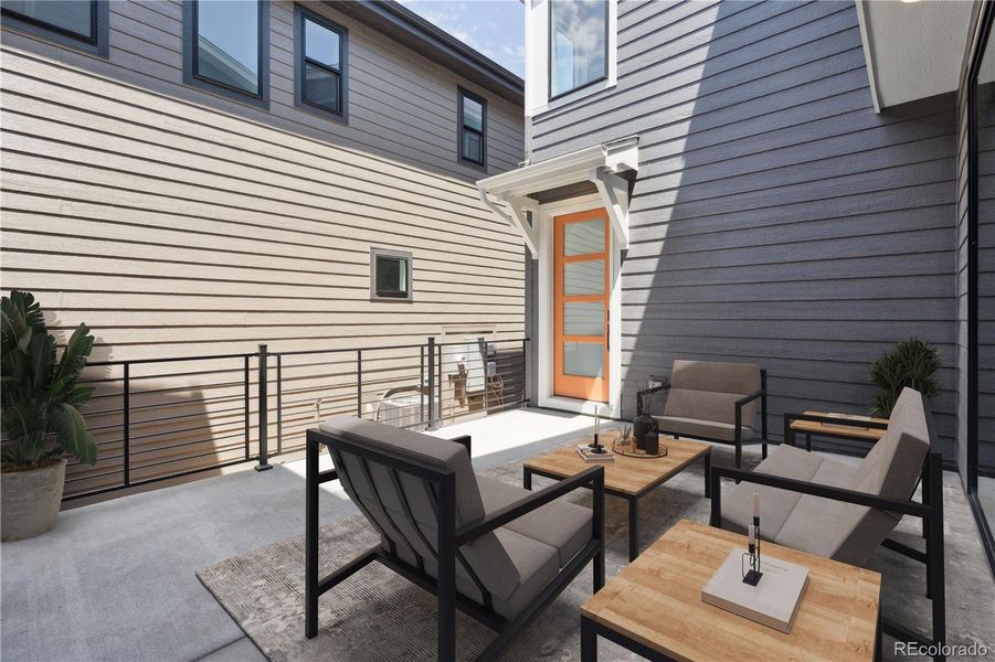 Exterior details and patio area of a home in Storytellers at Lyric, Lone Tree (Image 4).