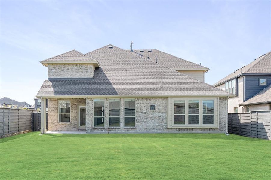 Front exterior of a new home in Union Park Classic 55, Little Elm, TX, highlighting curb appeal (Image 24). Front exterior of a new home in Union Park Classic 55, Little Elm, TX, highlighting curb appeal (Image 24).