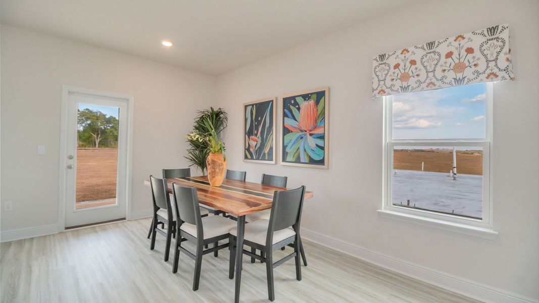 Furnished interior view inside a new home in Magnolia at the Bluffs Phase 3, Freeport (Image 13).