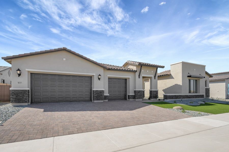 Front exterior of a new home in Suelo at Legado West, Queen Creek, AZ, highlighting curb appeal (Image 26).