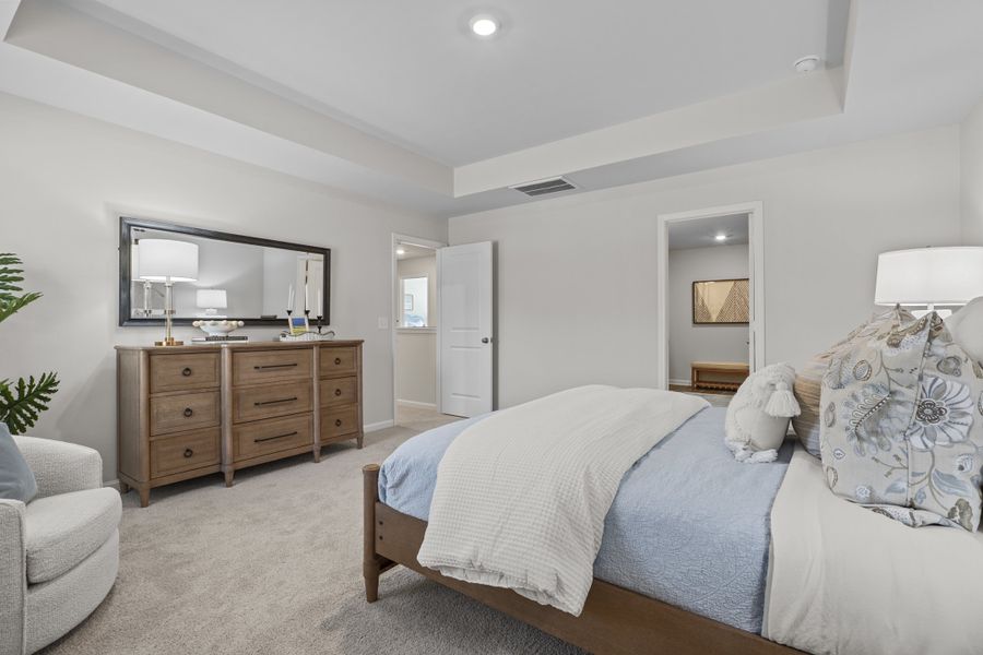 Representative furnished interior of a home built from the Myrtle L by McGuinn Homes in Canary Woods, Hopkins (Image 18). Representative furnished interior of a home built from the Myrtle L by McGuinn Homes in Canary Woods, Hopkins (Image 18).