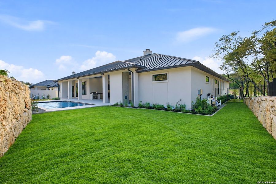 Exterior details and patio area of a home in , San Antonio (Image 29).