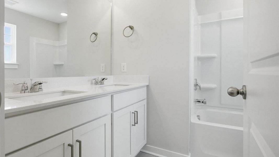 Bathroom with dual vanity and shower Bathroom with dual vanity and shower