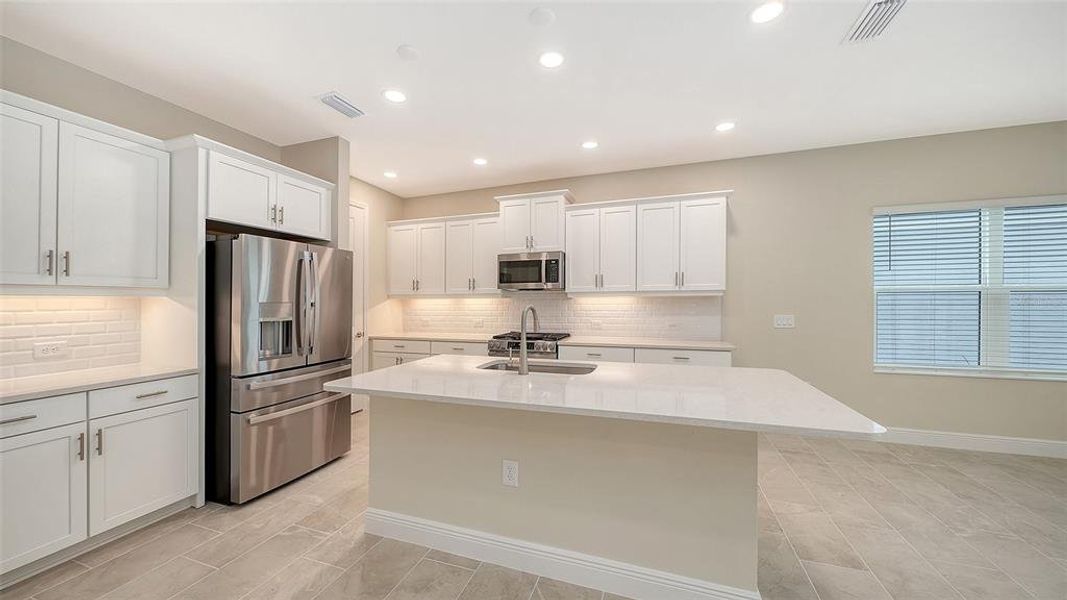 Furnished interior view inside a new home in Grand Park, Sarasota (Image 4).