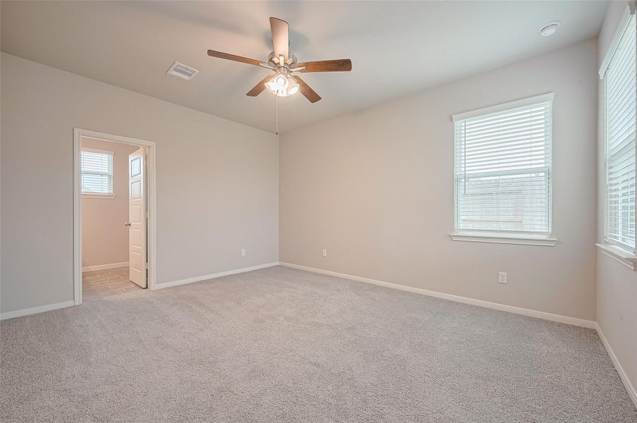 Spacious, unfurnished interior of a new home in Sunterra, Katy (Image 18).