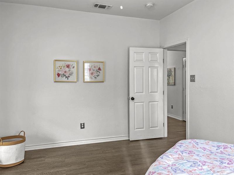 Bedroom #3 featuring wood-style floors